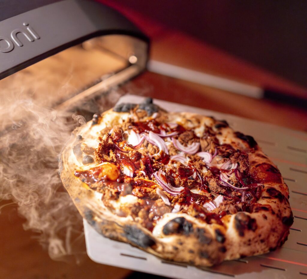 Gas pizza oven preheating quickly for fast outdoor pizza cooking